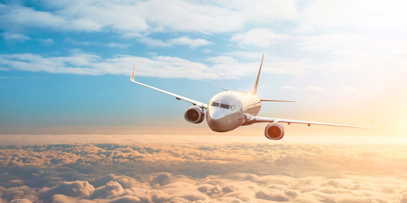 airplane-in-the-clouds-getty